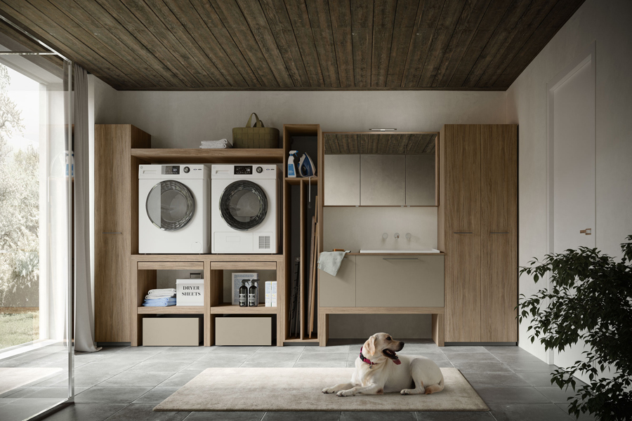 Arredo lavanderia su misura con mobili effetto legno, lavatrice, asciugatrice e tappeto