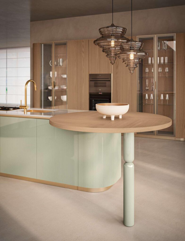 Dettaglio top Laminam e tavolo snack cucina DOMINA Aster Cucine